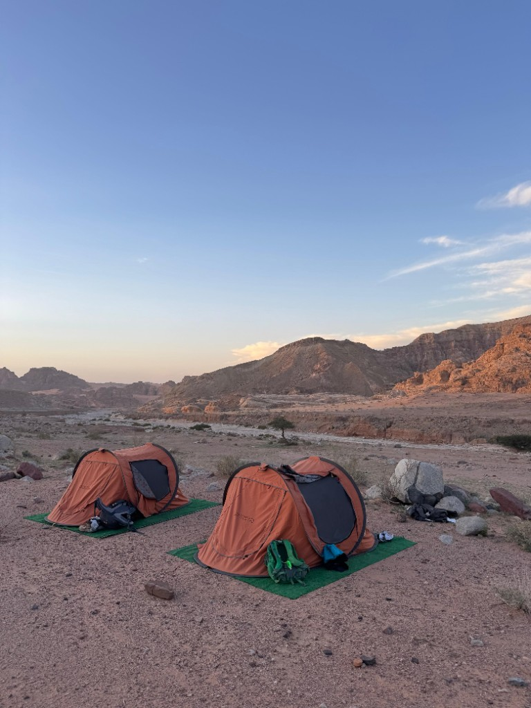 Trail tents set beneath the Jordanian mountains